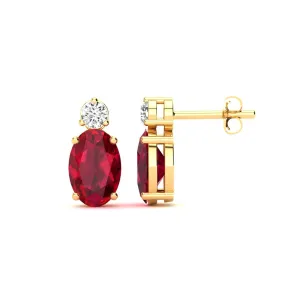 1 Carat Oval Ruby And Diamond Stud Earrings In 14 Karat Yellow Gold