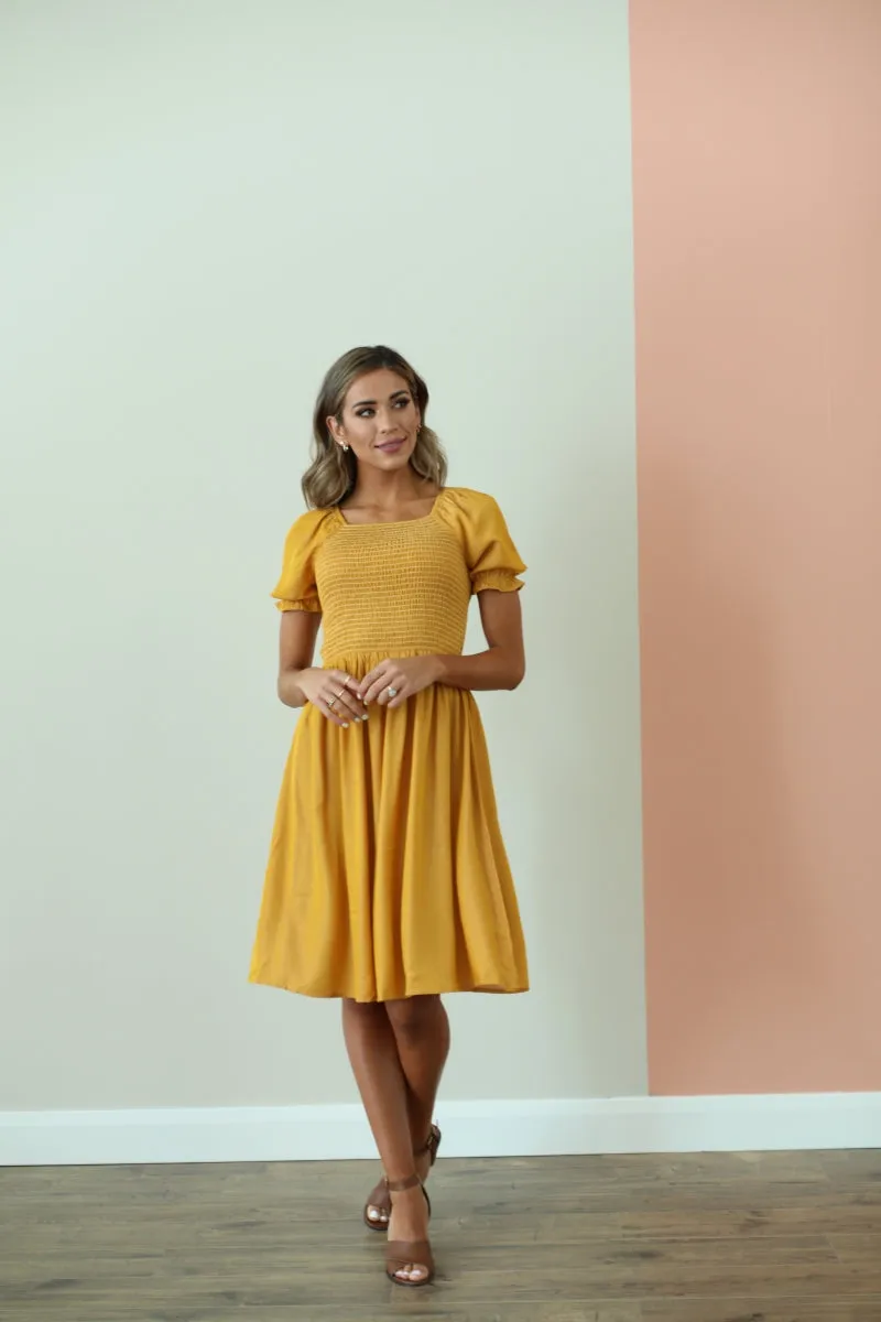 Annalise Smocked Dress in Mustard